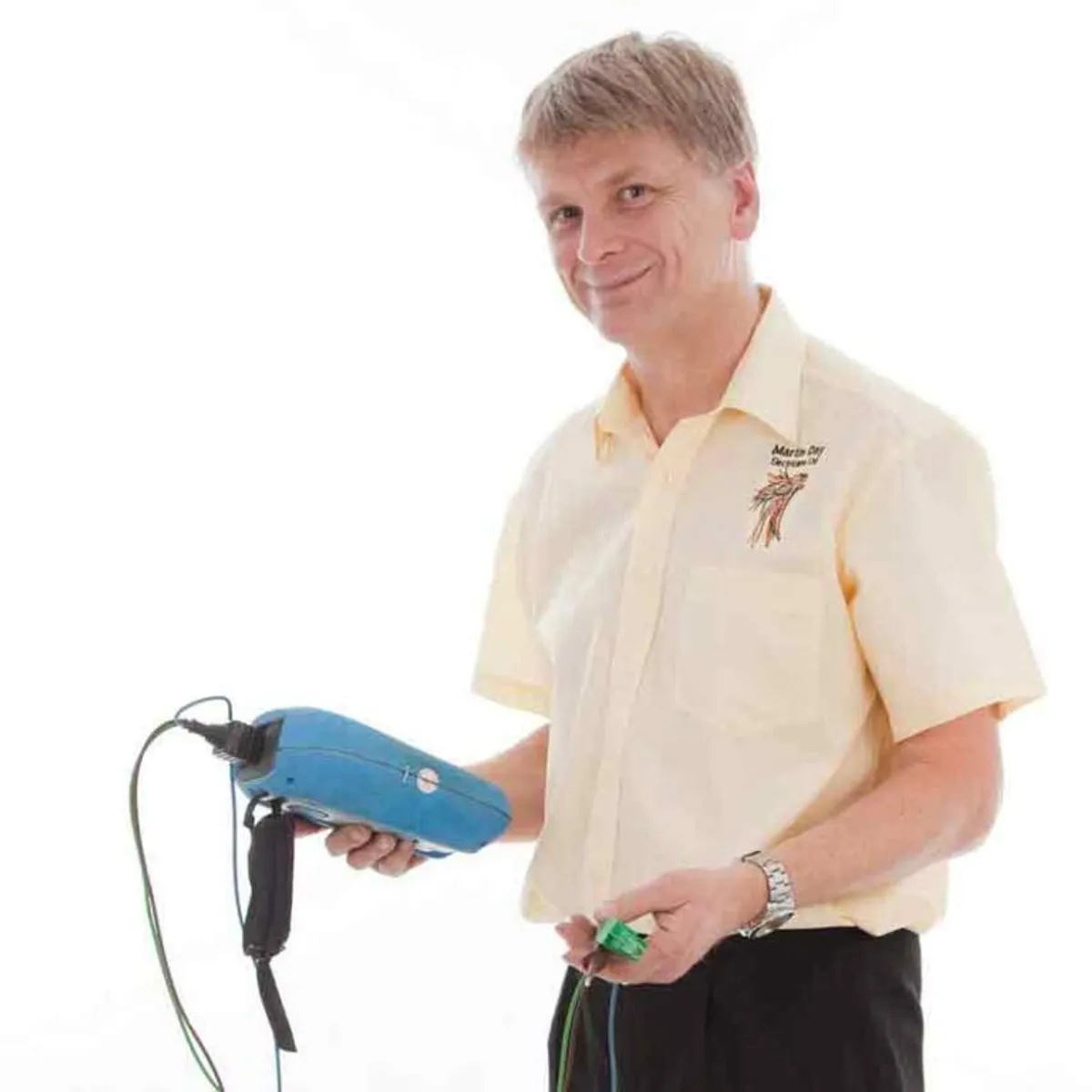 Commercial electrician carrying out testing on a Huddersfield site